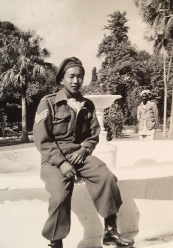 Henry Fung takes a cigarette break in India, where he did some of his commando training. 