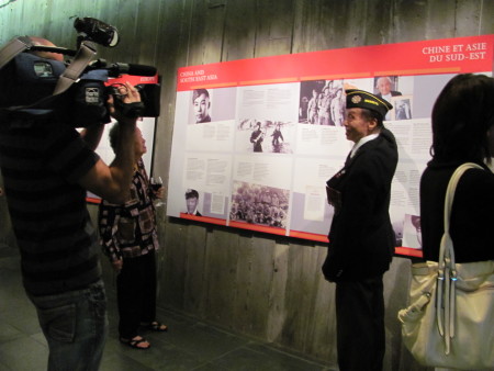 WWII veteran Ed Lee, points to a photo of himself taken while he was stationed in India. 