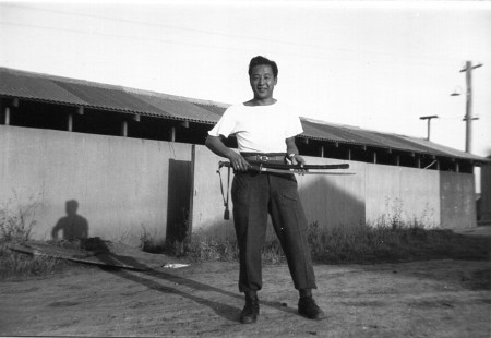 Harden Lee playing with a Japanese sword (Australia 1945)