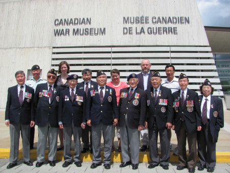 Chinese Canadian veterans delegation poses with Canadian War Museum and other supporters.